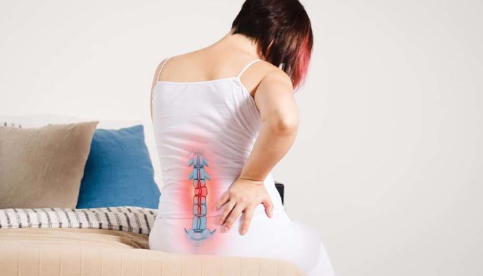 https://www.ns2.md/uploads/_700x400_crop_center-center_80_none/woman-with-back-pain-spine-image-showing-on-shirt.jpg
